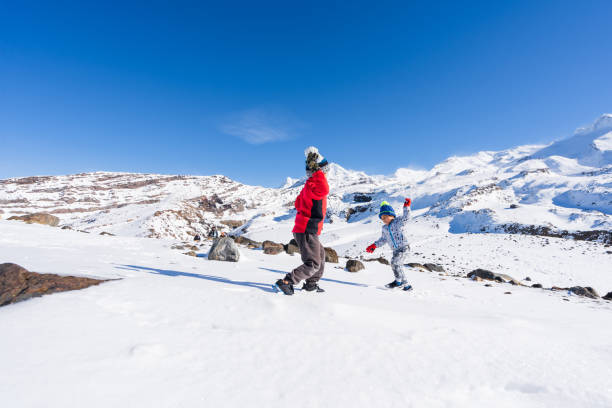 istock Kids enjoying winter snow. 1271471724