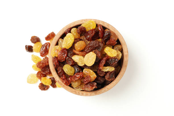 istock Bowl with raisins isolated on white background 1271471728