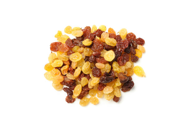 istock Bunch of raisins isolated on white background 1271471823