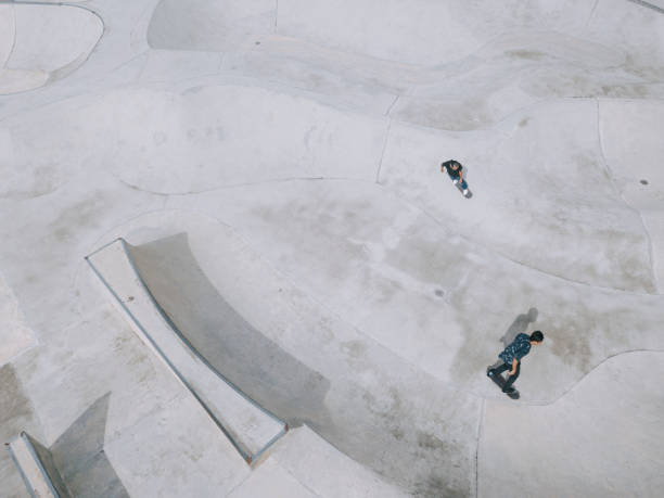 Asian skateboarder in action