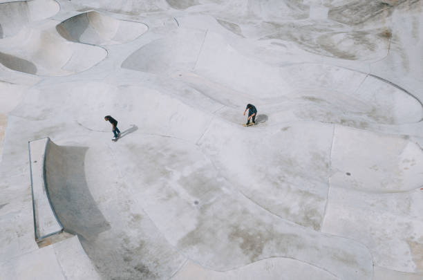 istock Asian skateboarder in action 1271473177