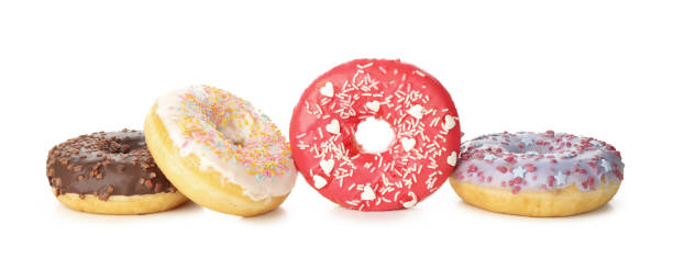 istock Tasty baked donuts isolated on white background 1271474465