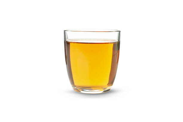 istock Glass of fresh grape juice isolated on white background 1271476880