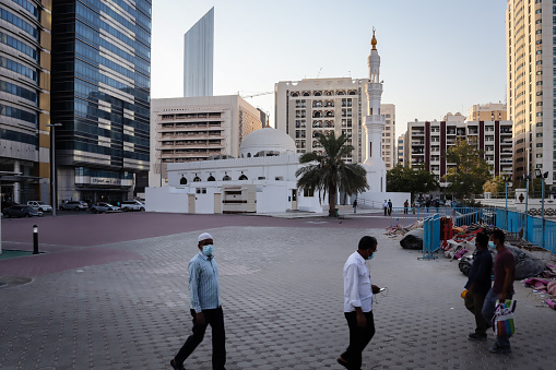 Abu Dhabi City life style at the time of coronavirus outbreaks, 8 september 2020 - United Arab Emirates. motion blur through long-term exposure, pandemic city life concept during covid-19 outbreak.