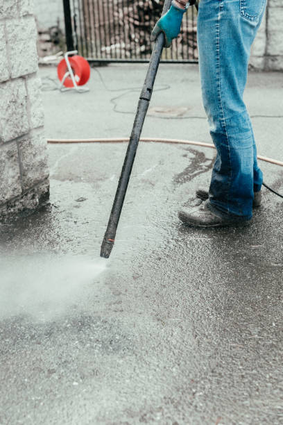istock Pressure washer used to clean driveway 1271481633