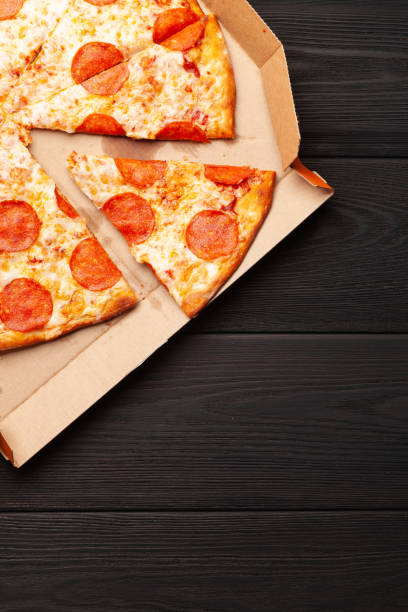 istock Tasty pepperoni pizza with salami 1271482458