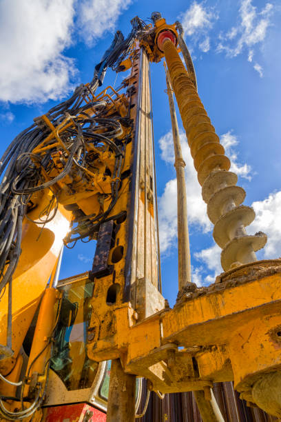 industrial drilling machine at the construction site - drill mining rock borehole imagens e fotografias de stock