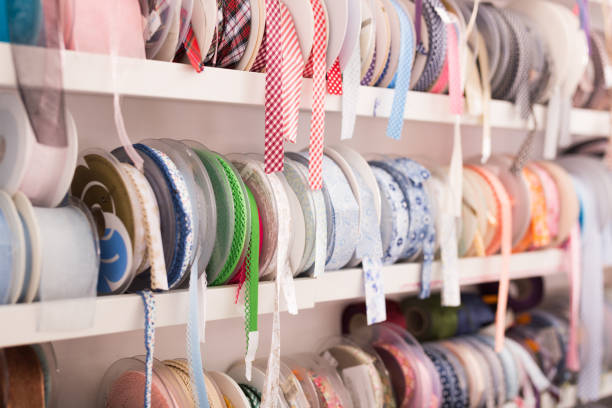 istock Colorful ribbons on counter in store 1271483040
