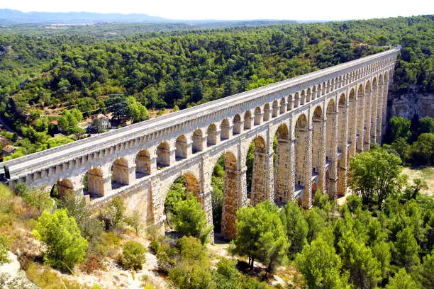 The aqueduct of Roquefavour was built from 1841 to 1847 by Jean François Mayor de Montricher and William Fraisse to carry water from the Durance River to the city of Marseille.
Its design was inspired by the nearby ancient Roman aqueduct "Pont du Gard".
At nearly 83 meters, it is currently the tallest stone aqueduct in the world.
It is located close to the village of Ventabren near Aix-en-Provence in the South of France.