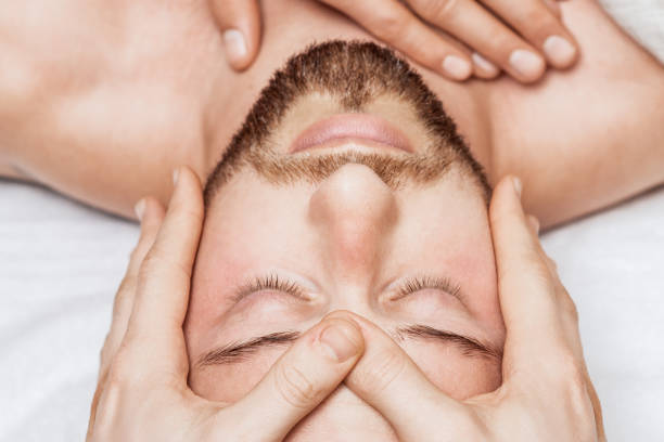 istock Man receiving relaxing head massage. 1271490024