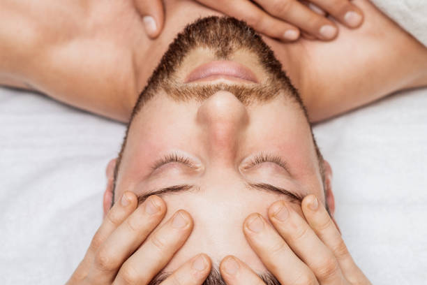 istock Man receiving relaxing head massage. 1271490040