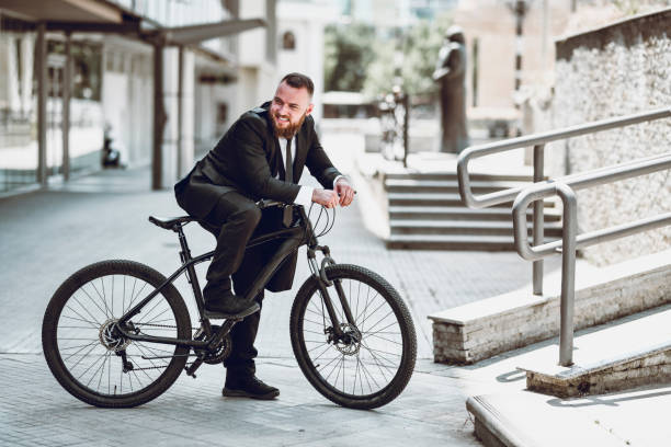 istock Business Cyclist Enjoying Time Spent With Bicycle Outside 1271490944