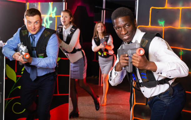 istock men and women co-workers having corporate entertainment 1271492210