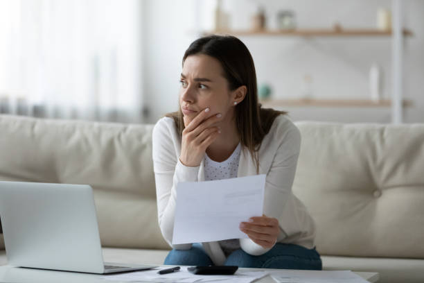 istock Stressed millennial woman thinking of financial problems. 1271492865