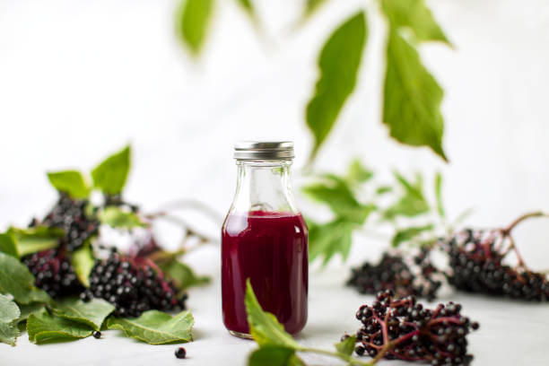istock Elderberry syrup in a bottle, front view 1271495870