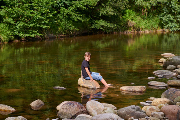 istock child enjoying in the mountains 1271496564