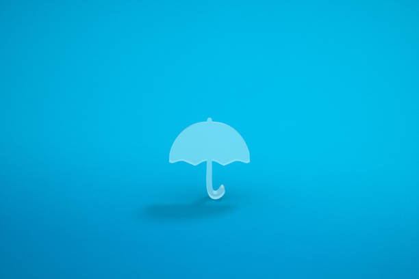 istock An umbrella icon in a blue background. 3D rendering. 1271500142