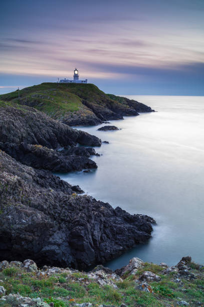 istock Strumble Head Lighthouse, Pembrokeshire, at sunset 1271501763