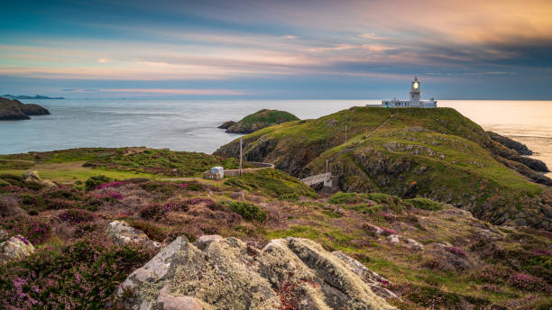 istock Strumble Head Lighthouse, Pembrokeshire, at sunset 1271501794