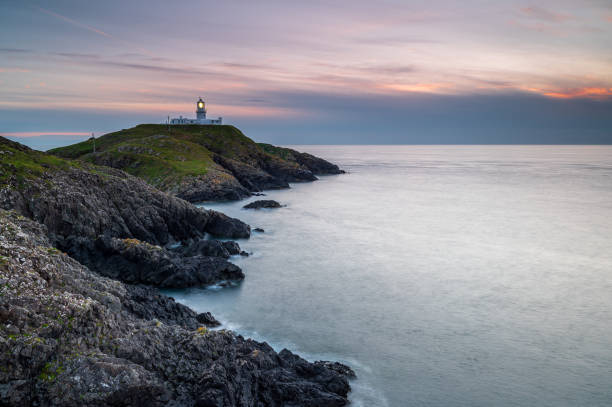 istock Strumble Head Lighthouse, Pembrokeshire, at sunset 1271501862
