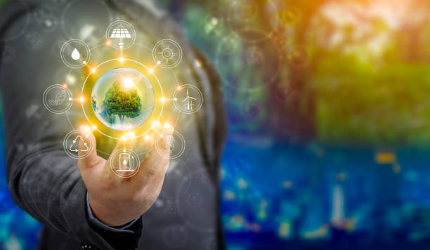 istock Renewable energy concept Earth Day or environment protection Hands protect forests that grow on the ground and help save the world. 1271502726