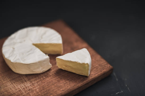 istock cheese camembert with mold on cutting board 1271506517