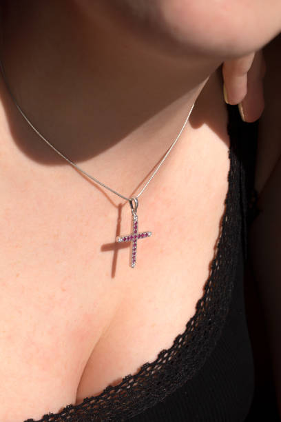 istock The Religious cross on the woman's chest with shadow 1271512902