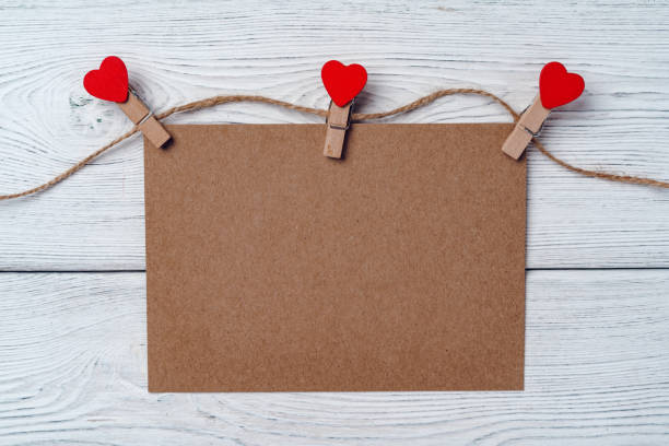 istock Heart clothespins on rope. Creative background with copy space 1271513697