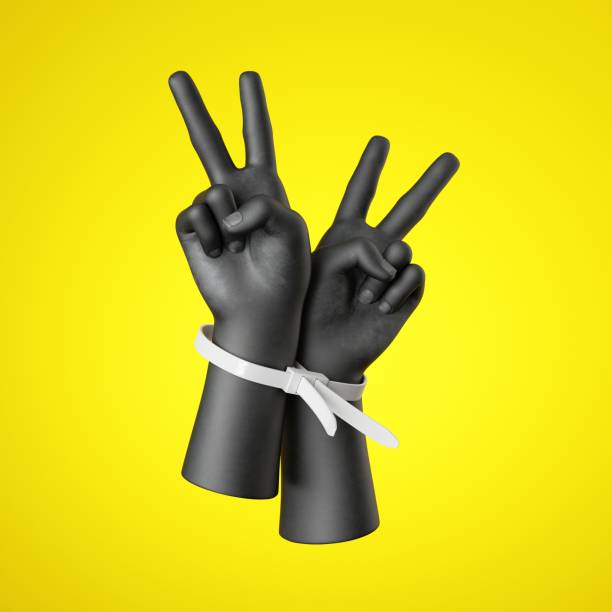 3d render, black human hands tied with plastic zip ties, isolated on yellow background. victory gesture. social justice, human rights concept. - anti racism imagens e fotografias de stock