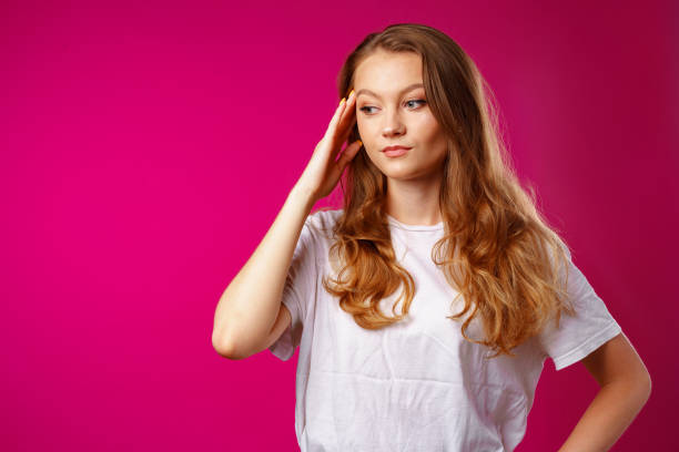 istock Young beautiful woman suffering from headache with hands on head 1271513974