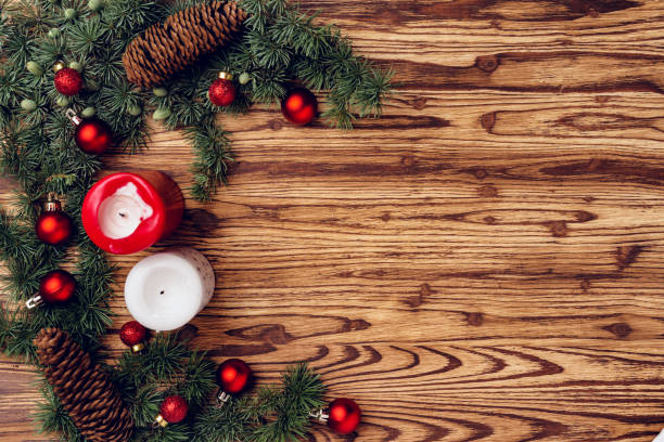 istock Christmas background with decorations on brown wooden board 1271513998