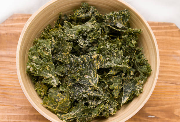 istock Kale chips in a bowl. Close-up 1271515059