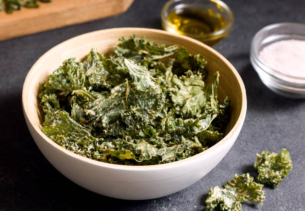 istock Kale chips in a bowl on a black table 1271515081