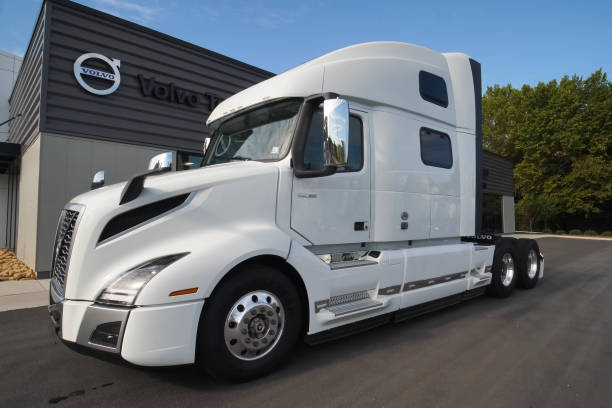 A new white Volvo truck near the car dealership. Moscow, Russia - June 24, 2020: A new white Volvo truck near the car dealership. volvo stock pictures, royalty-free photos & images