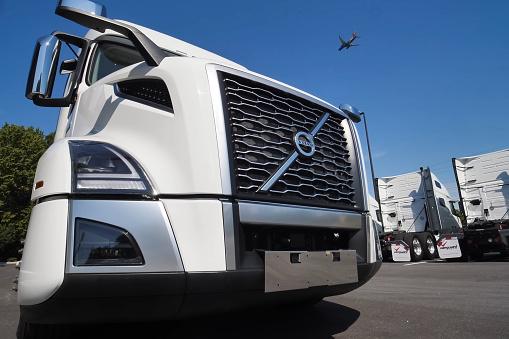 Moscow, Russia - June 24, 2020: A new white Volvo truck near the car dealership.