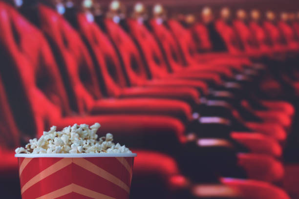 istock pop corn and on red armchair cinema 1271522544