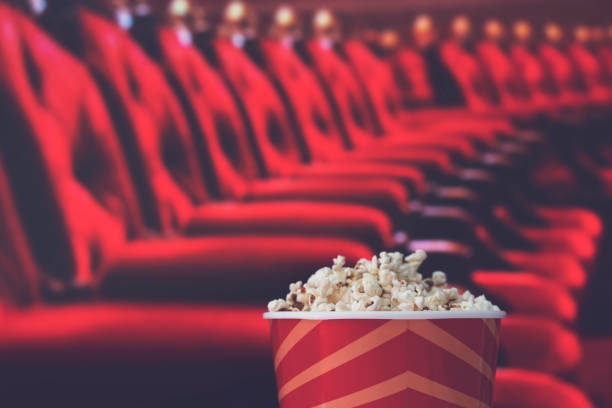 istock pop corn and on red armchair cinema 1271522592