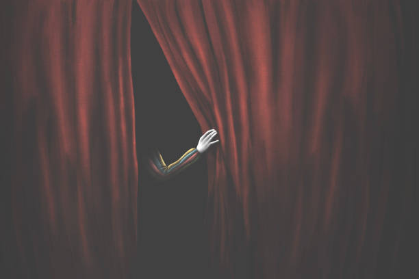 mysterious circus clown behind red curtains ready for funny performance, surreal concept