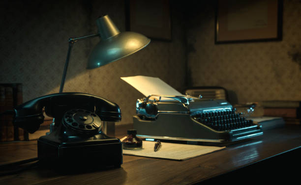 istock Vintage film noir office desk with old typewriter 1271530518