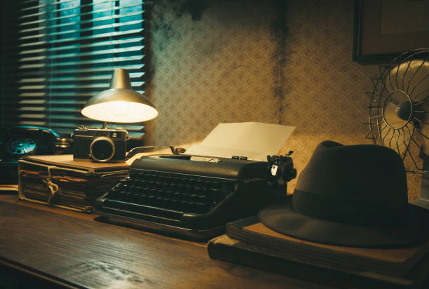 istock Vintage film noir office desk with old typewriter 1271531457