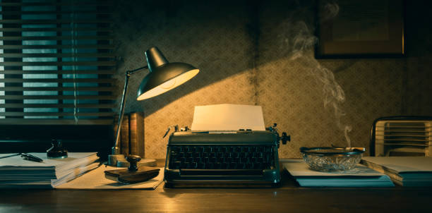 istock Vintage film noir office desk with old typewriter 1271531683