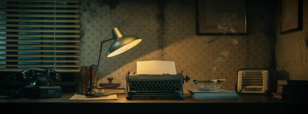istock Vintage film noir office desk with old typewriter 1271532268