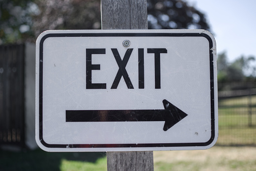 exit sign in hallway of office building