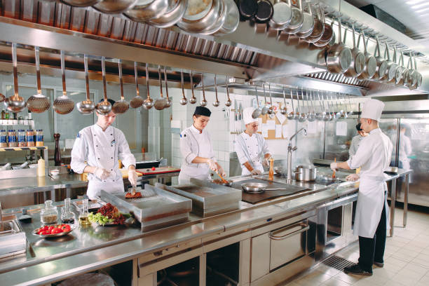 istock Modern kitchen. The chefs prepare meals in the restaurant's kitchen 1271539349