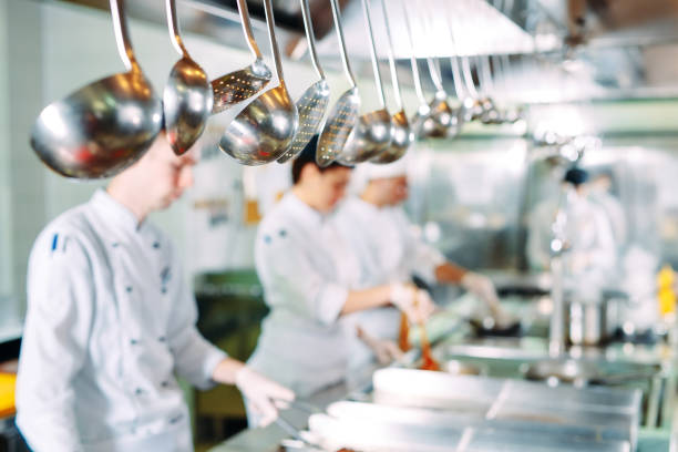 istock Modern kitchen. The chefs prepare meals in the restaurant's kitchen 1271539439