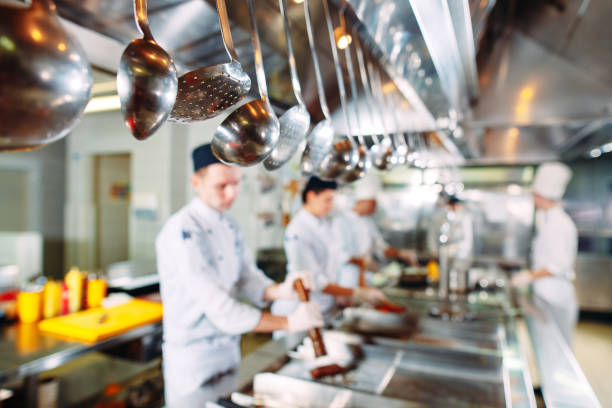 istock Modern kitchen. The chefs prepare meals in the restaurant's kitchen 1271539474
