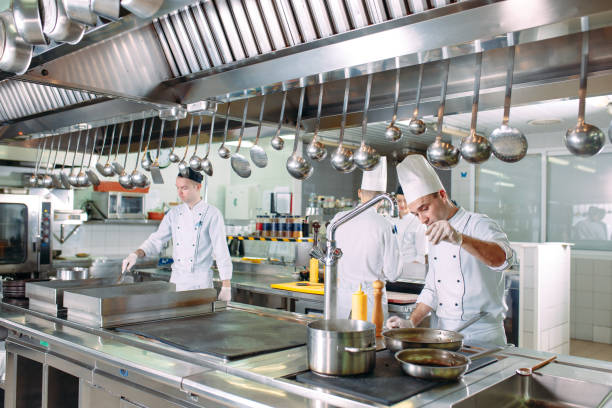 istock Modern kitchen. The chefs prepare meals in the restaurant's kitchen 1271539624