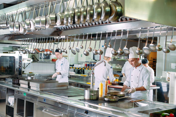 istock Modern kitchen. The chefs prepare meals in the restaurant's kitchen 1271539664