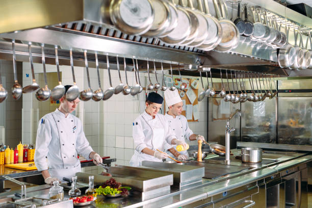 istock Modern kitchen. The chefs prepare meals in the restaurant's kitchen 1271539711