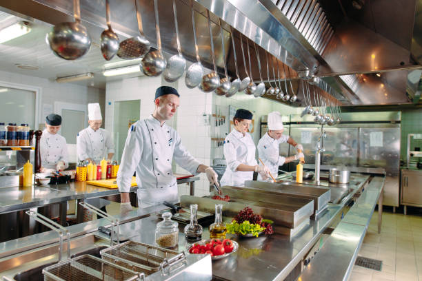 istock Modern kitchen. The chefs prepare meals in the restaurant's kitchen 1271539750